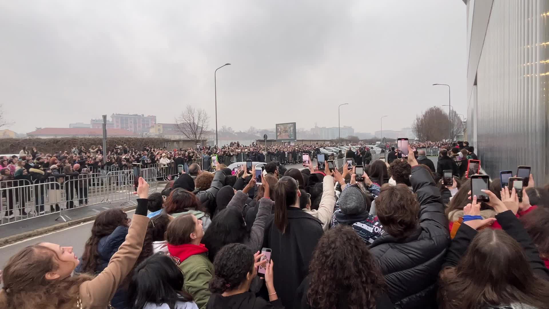 The crowd for the arrival of the South Korean boy band Enhypen at the Prada fashion show during the Milan Men’s Fashion Week Fall/Winter 2023/2024