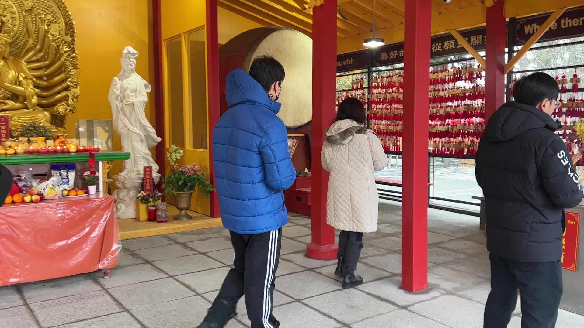 Chinese Buddhists offer prayers on the eve of the Lunar New Year