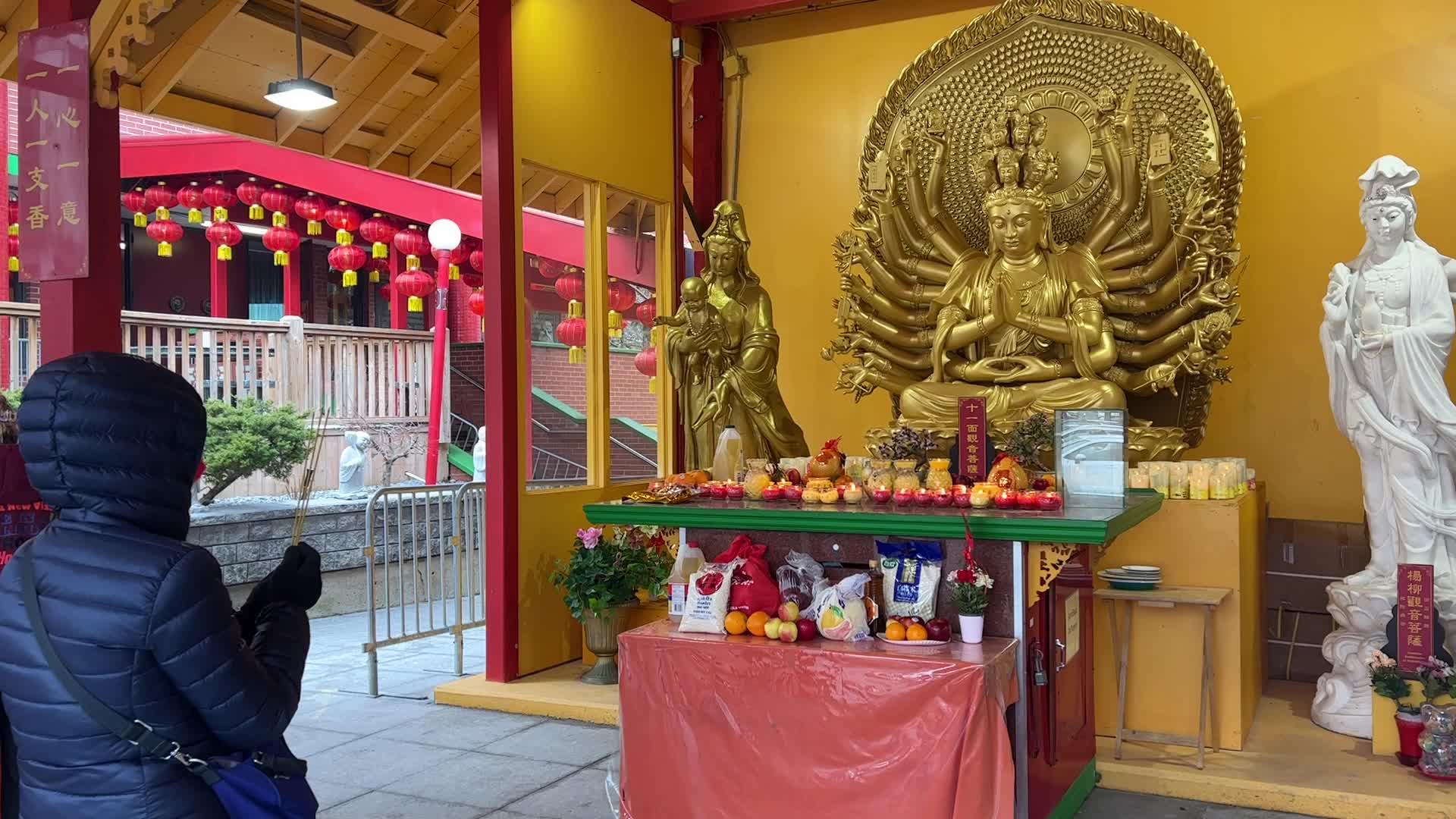 Chinese Buddhists offer prayers on the eve of the Lunar New Year
