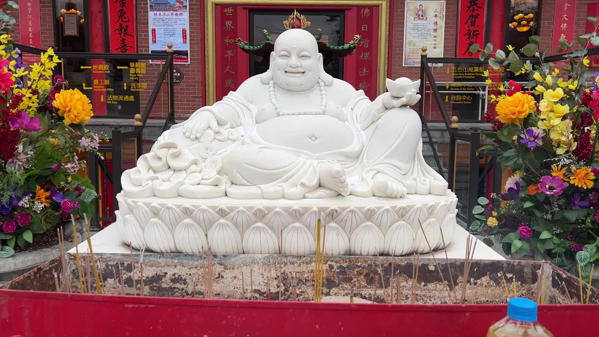 Chinese Buddhists offer prayers on the eve of the Lunar New Year
