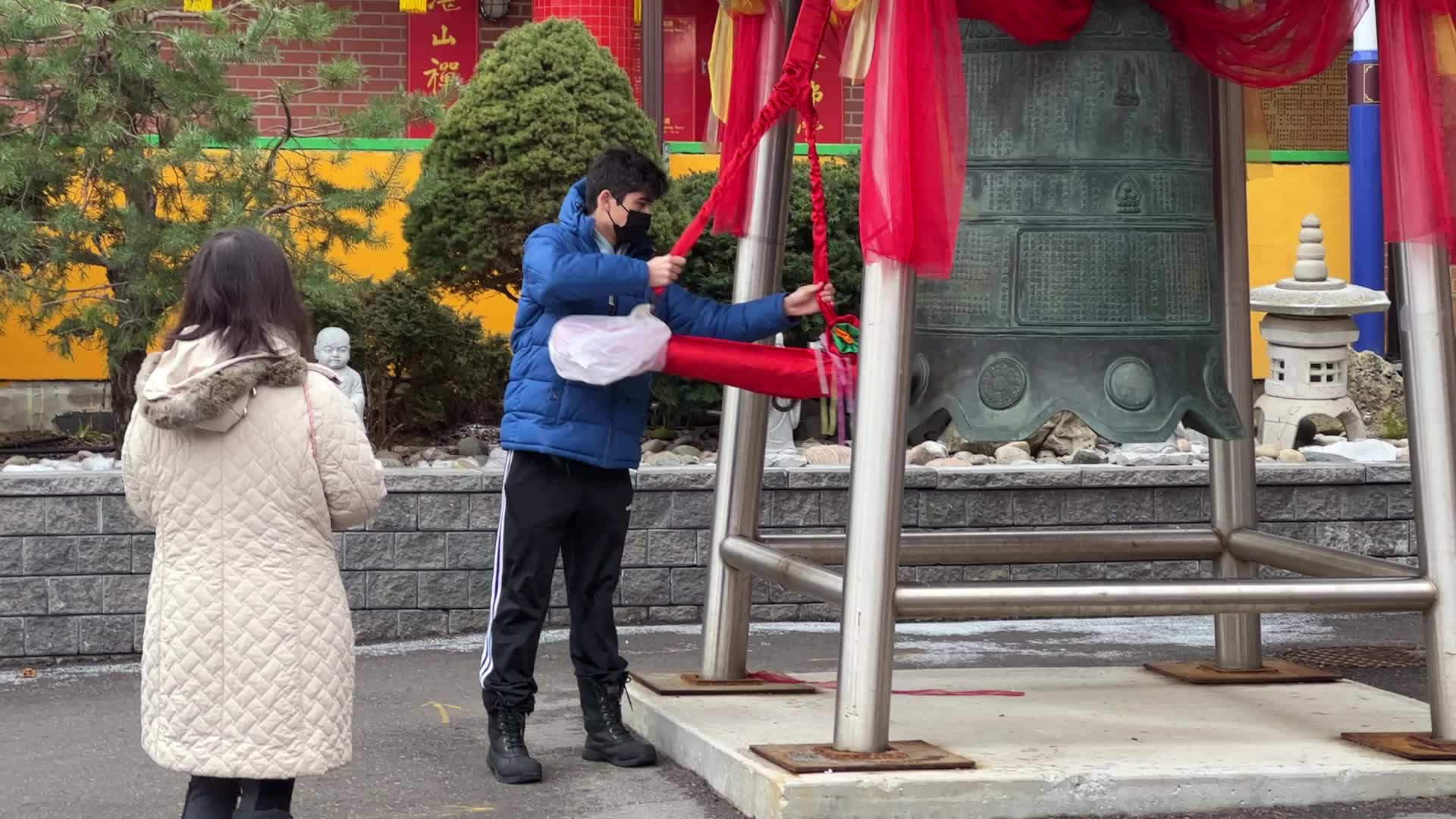 Chinese Buddhists offer prayers on the eve of the Lunar New Year