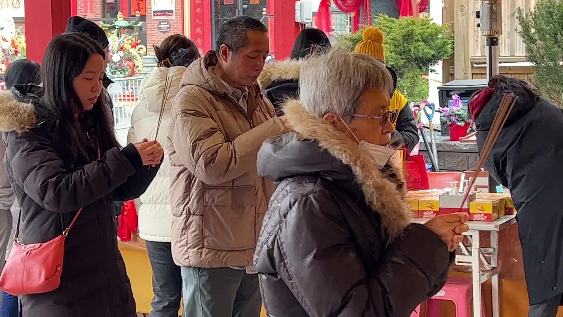 Chinese Buddhists offer prayers on the eve of the Lunar New Year