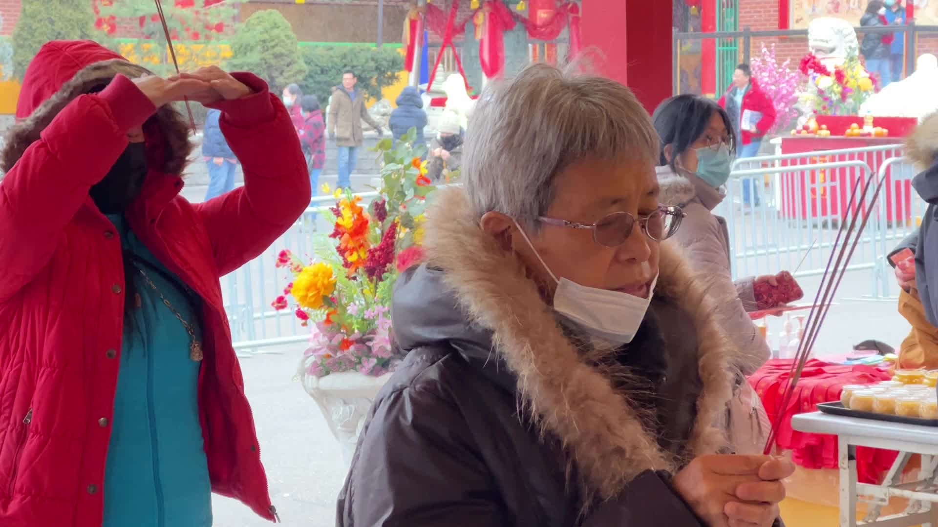 Chinese Buddhists offer prayers on the eve of the Lunar New Year