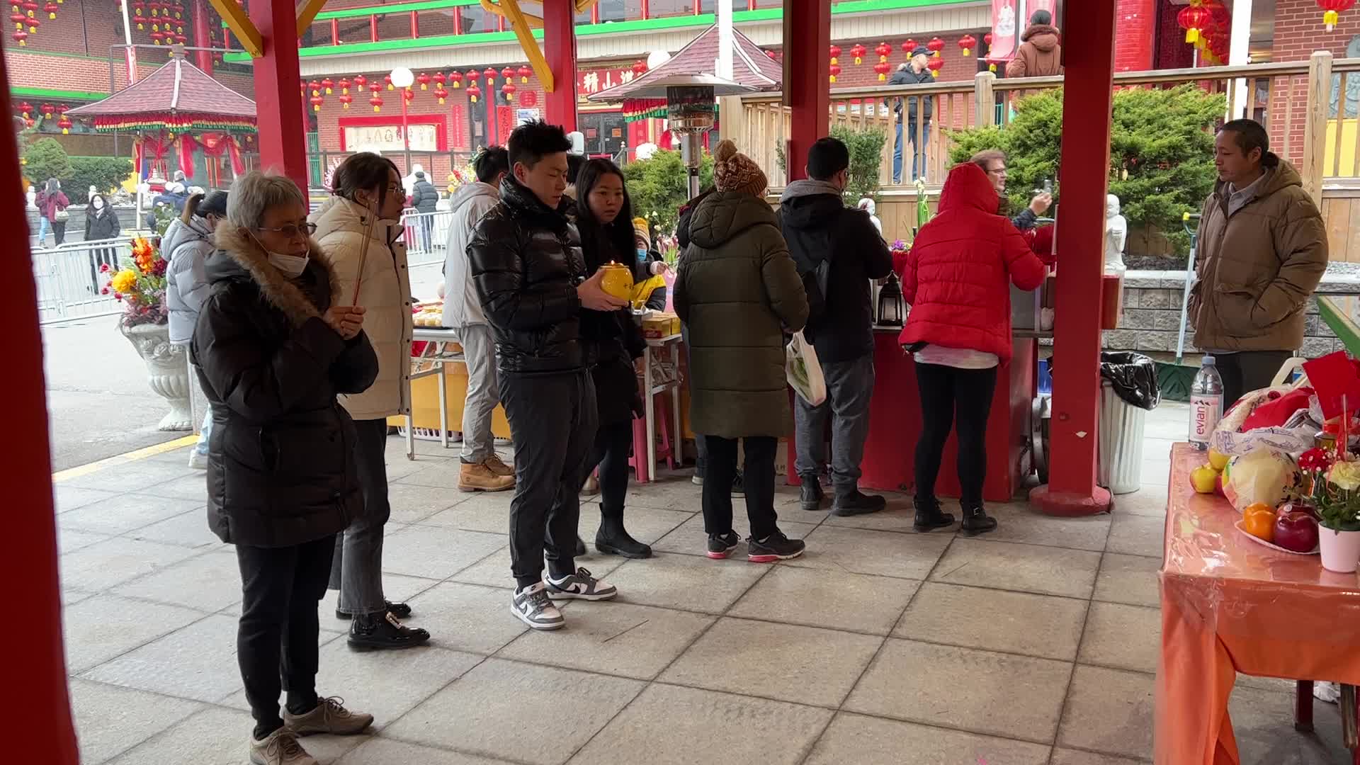 Chinese Buddhists offer prayers on the eve of the Lunar New Year