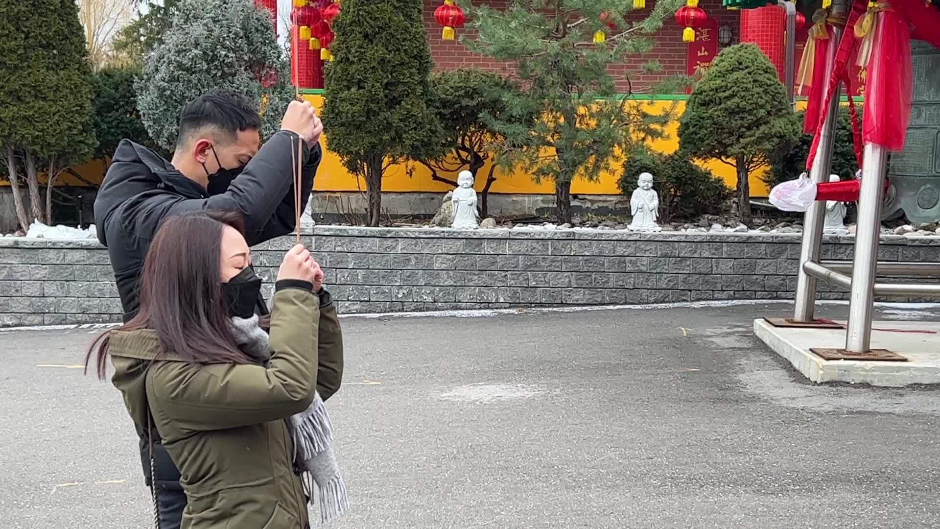 Chinese Buddhists offer prayers on the eve of the Lunar New Year