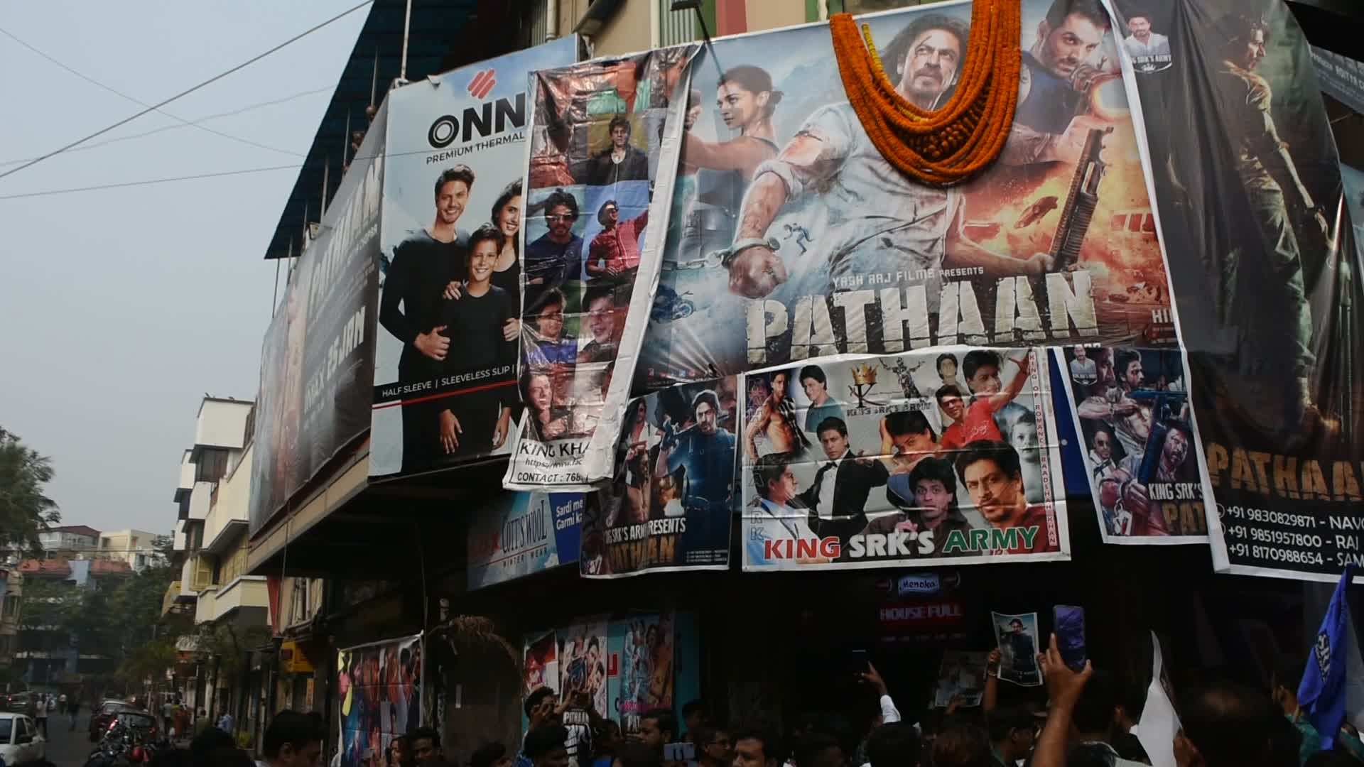 Sharukh Khan fan celebrate release of controversial Pathaan movie in India.