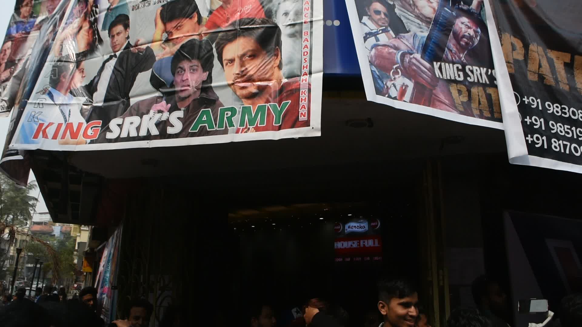 Sharukh Khan fan celebrate release of controversial Pathaan movie in India.