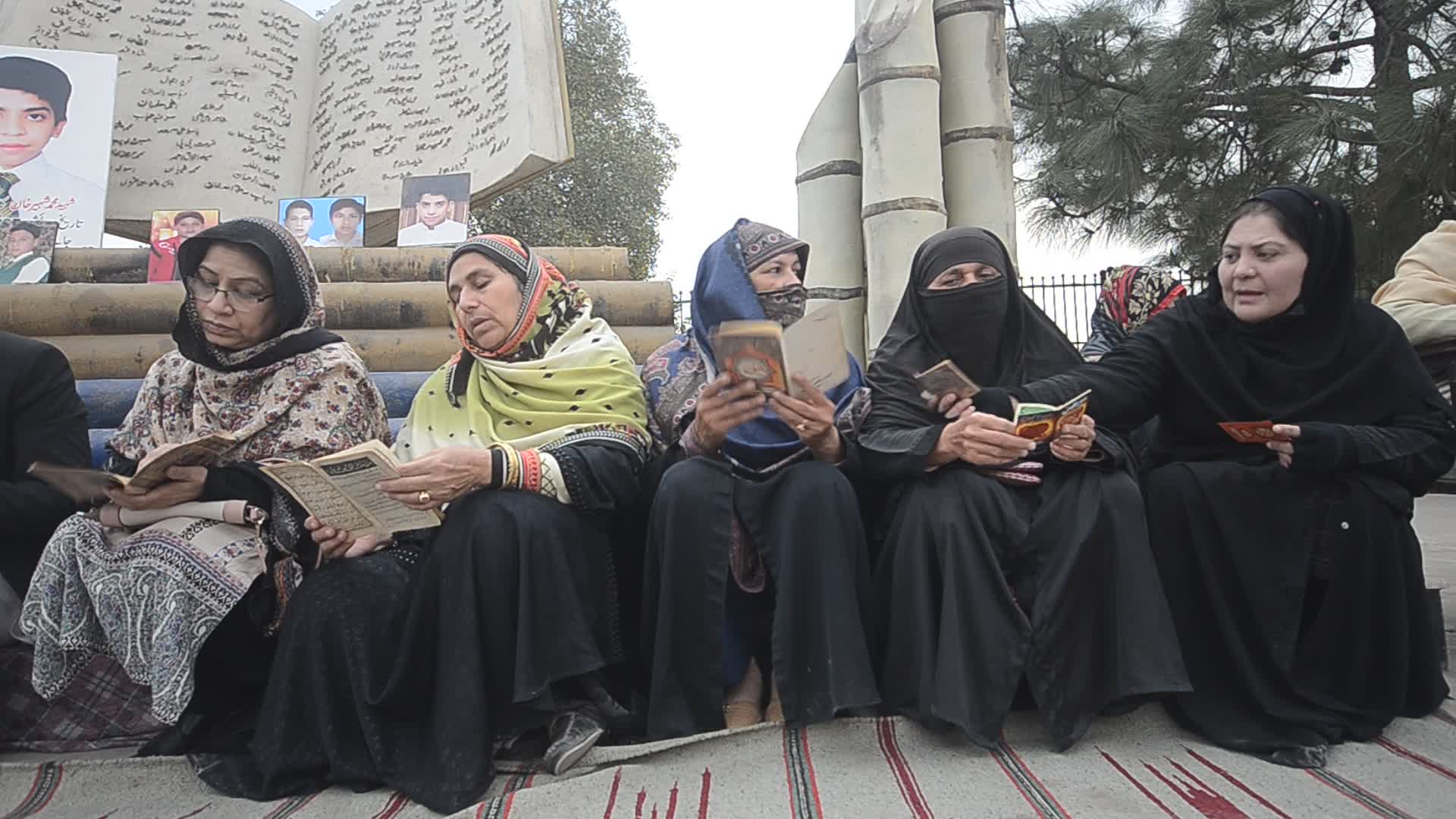 Candle light vigil for 102 people killed after a suicide bombing in a mosque in Peshawar