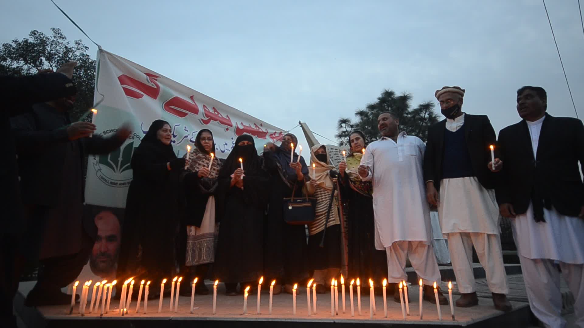 Candle light vigil for 102 people killed after a suicide bombing in a mosque in Peshawar