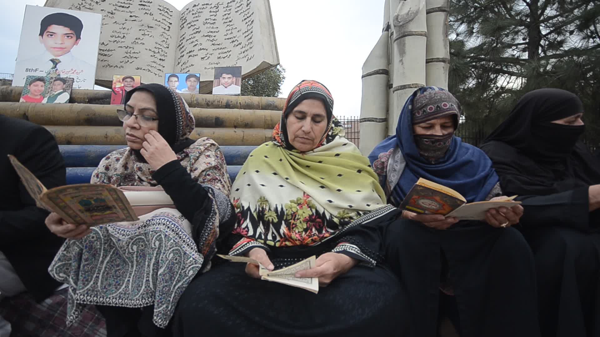 Candle light vigil for 102 people killed after a suicide bombing in a mosque in Peshawar