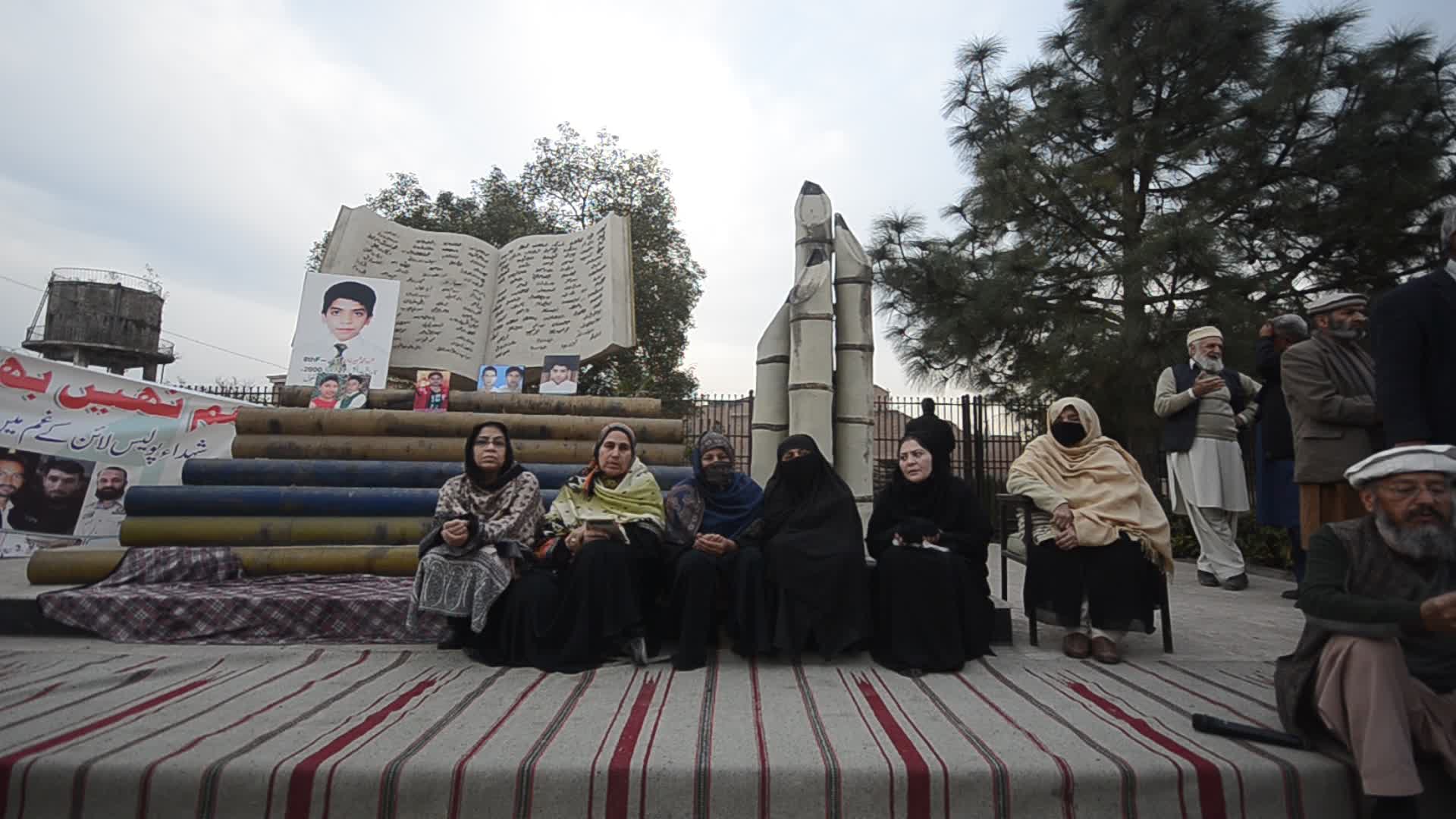 Candle light vigil for 102 people killed after a suicide bombing in a mosque in Peshawar
