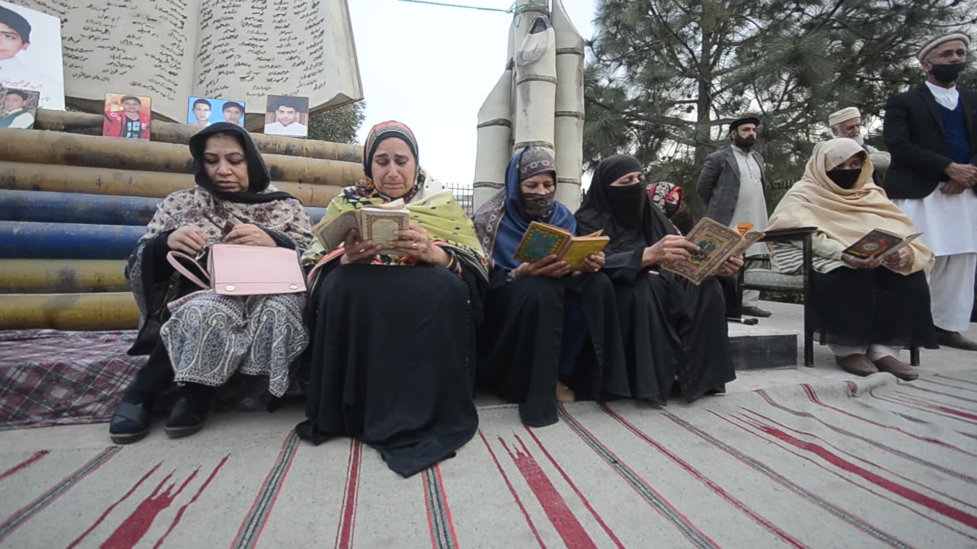 Candle light vigil for 102 people killed after a suicide bombing in a mosque in Peshawar