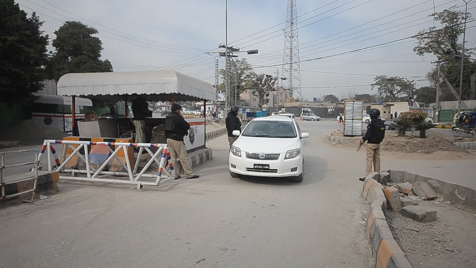 Police secure area of suicide bomb blast at a mosque that killed 100 people