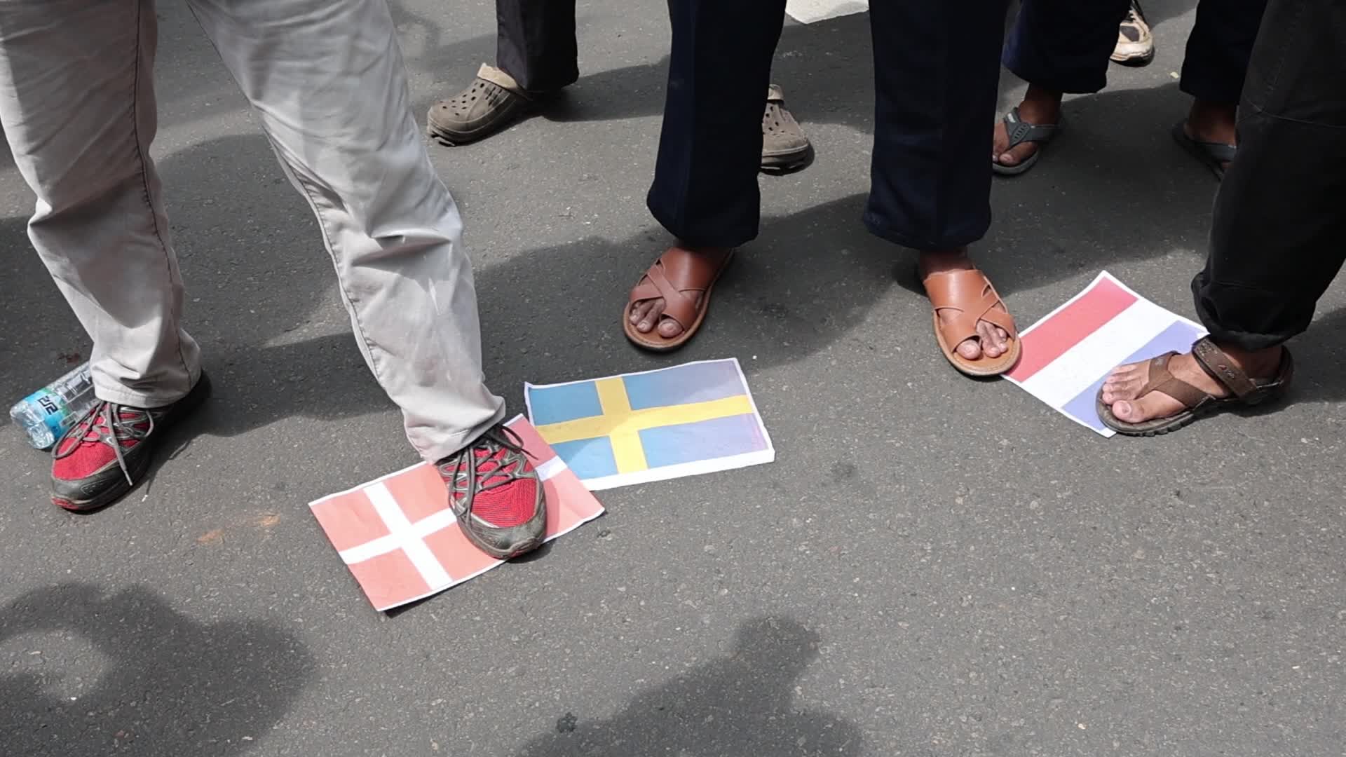 Protest Over Burning Qur'an Incident In Sweden Outside Swedish Embassy Building in Jakarta, Indonesia