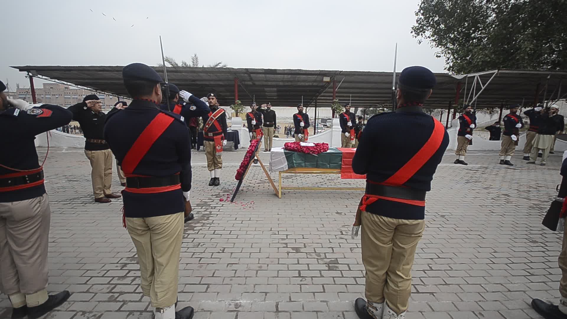 Funeral of a police official killed in a suicide bomb blast at a mosque
