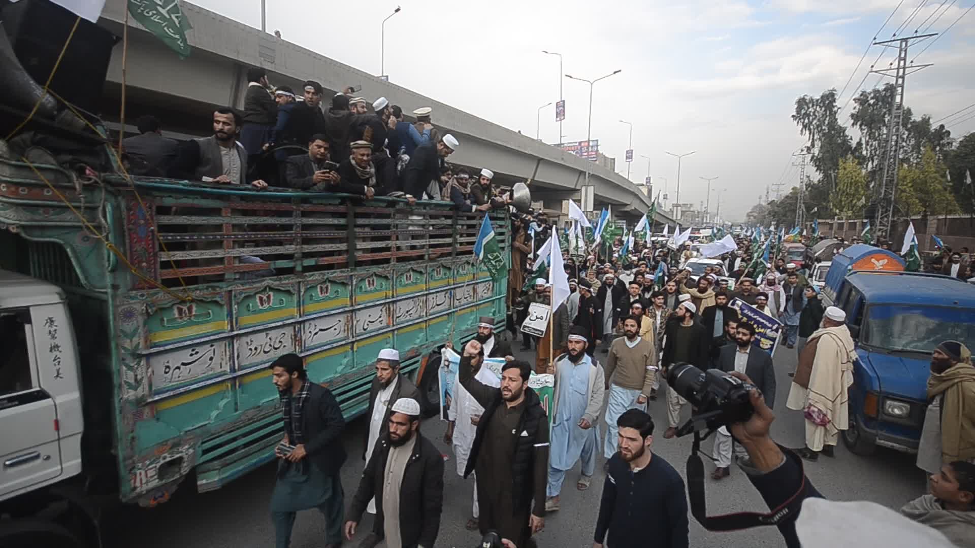 Peace march after suicide bombing at a mosque in Peshawar
