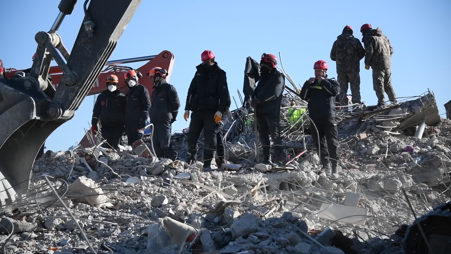 Search crews dig through rubble for missing people in Nurdagi, Gaziantep, Turkey