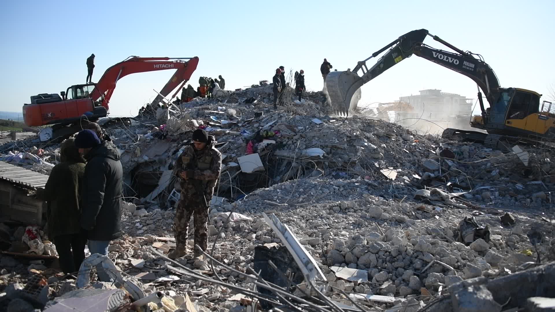 Search crews dig through rubble for missing people in Nurdagi, Gaziantep, Turkey