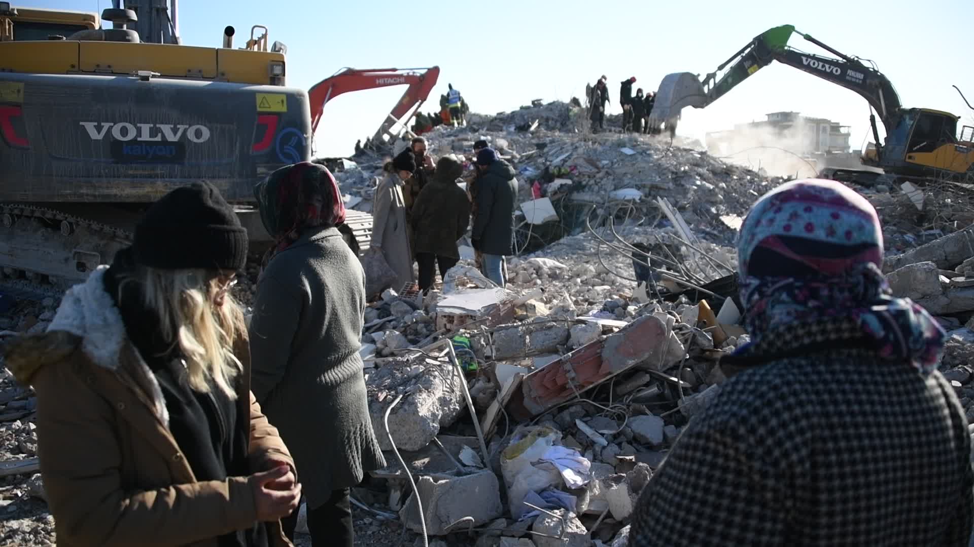 Search crews dig through rubble for missing people in Nurdagi, Gaziantep, Turkey