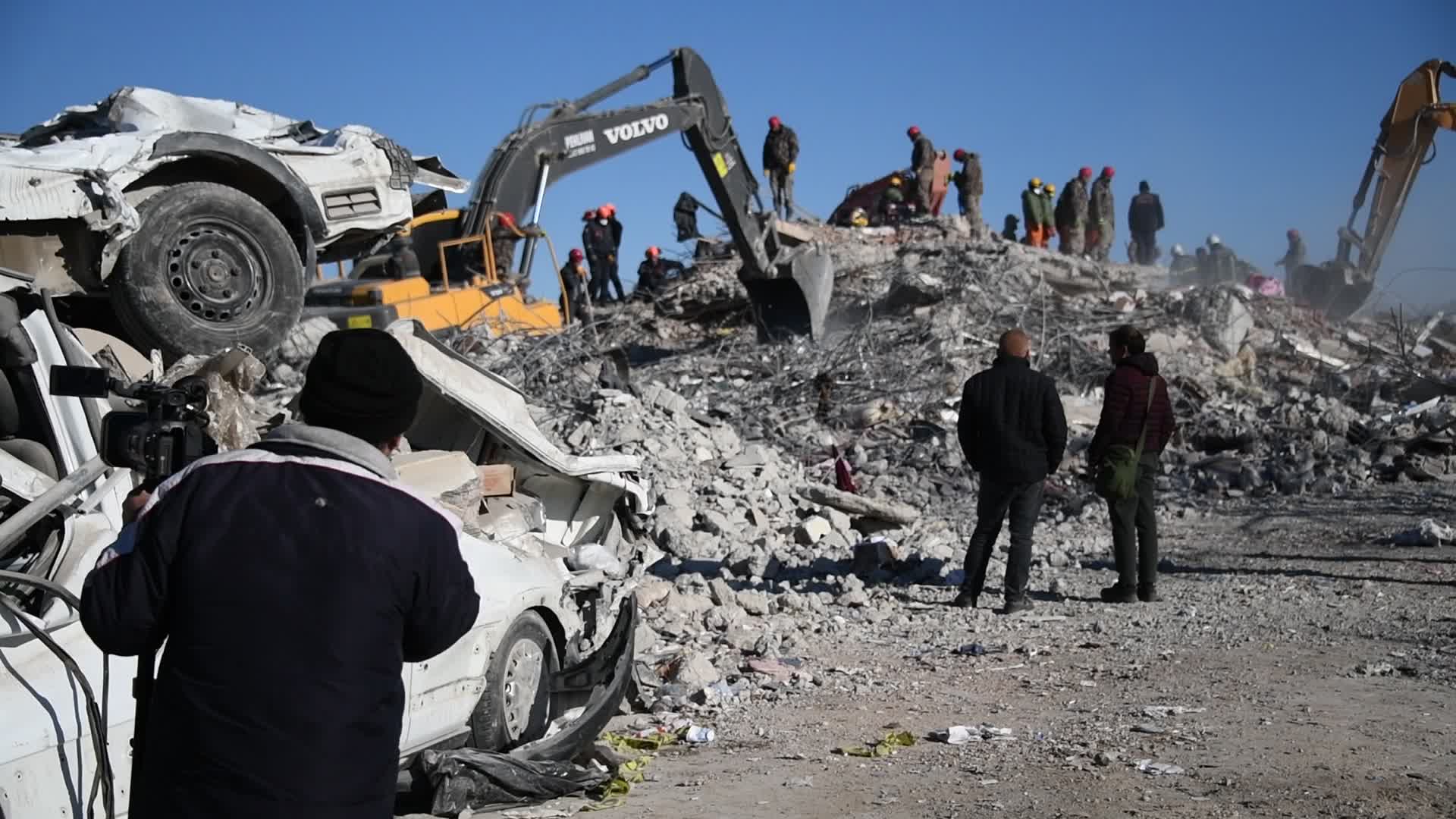 Search crews dig through rubble for missing people in Nurdagi, Gaziantep, Turkey