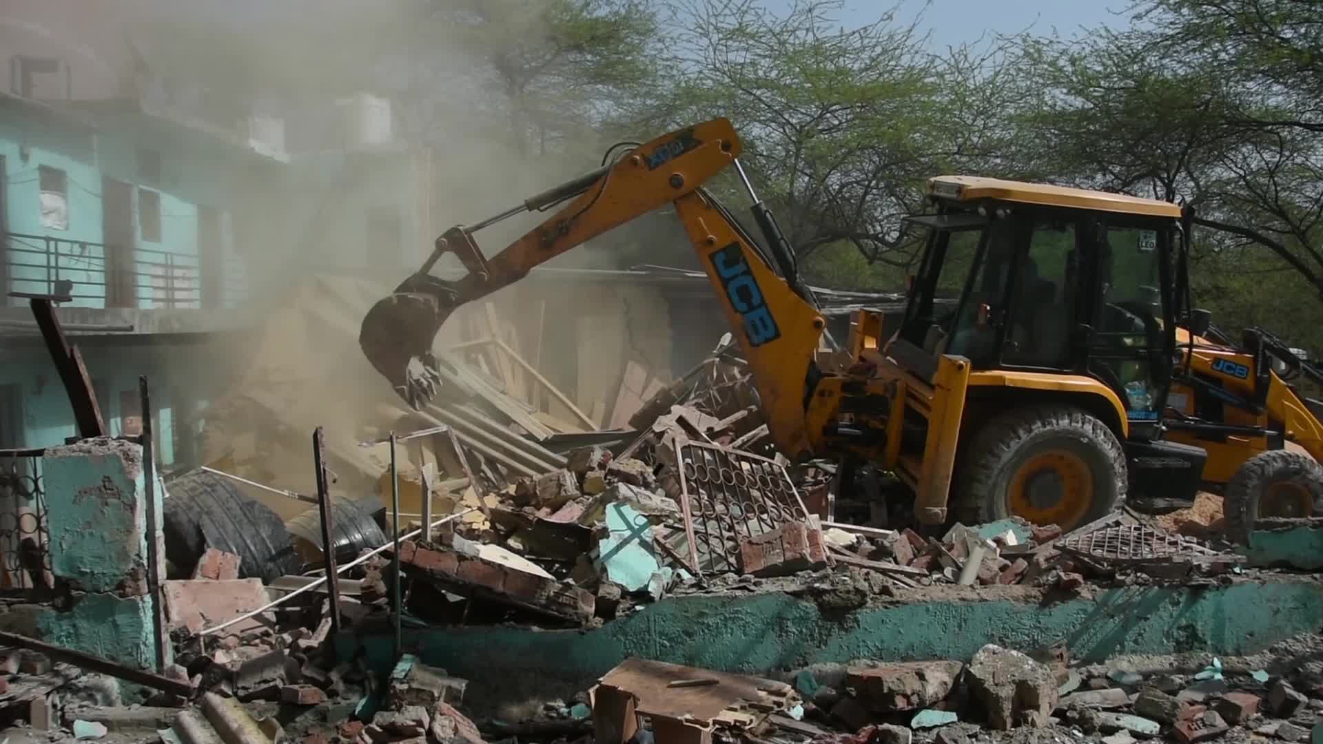 Heavy Machinery Razes Illegal Structures in Mehrauli, Delhi