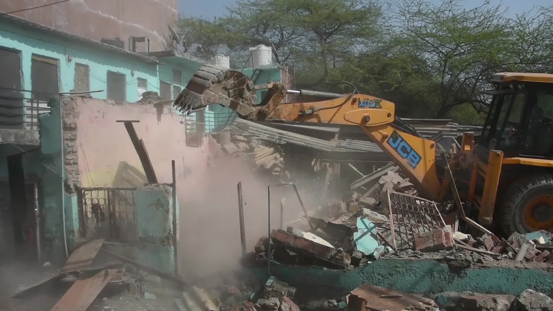 Heavy Machinery Razes Illegal Structures in Mehrauli, Delhi