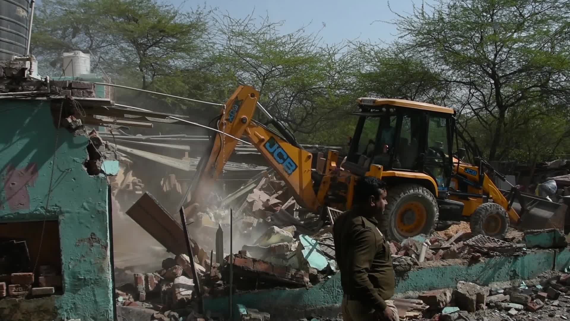 Heavy Machinery Razes Illegal Structures in Mehrauli, Delhi