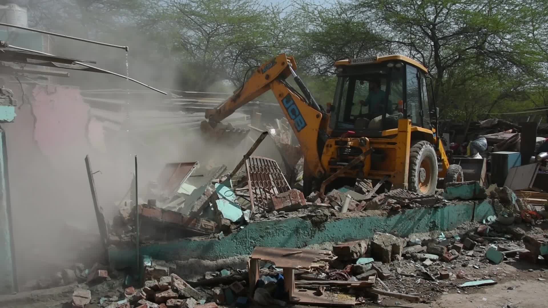 Heavy Machinery Razes Illegal Structures in Mehrauli, Delhi