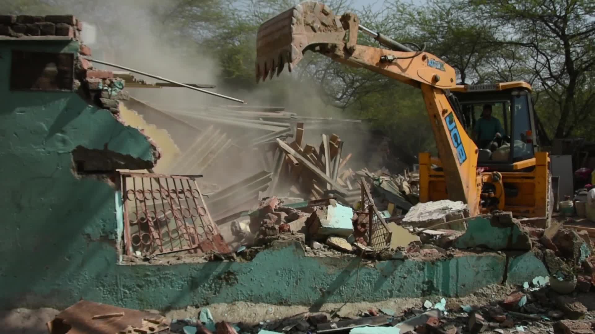Heavy Machinery Razes Illegal Structures in Mehrauli, Delhi