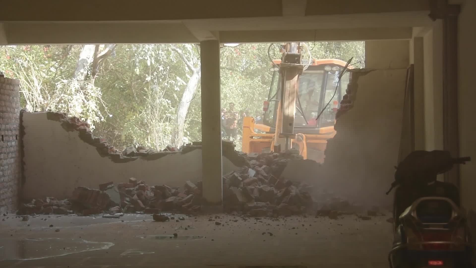 Heavy Machinery Razes Illegal Structures in Mehrauli, Delhi