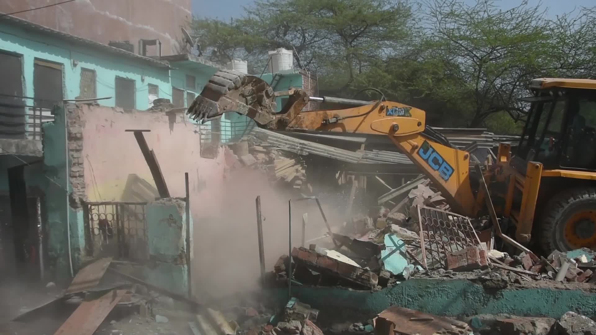 Heavy Machinery Razes Illegal Structures in Mehrauli, Delhi