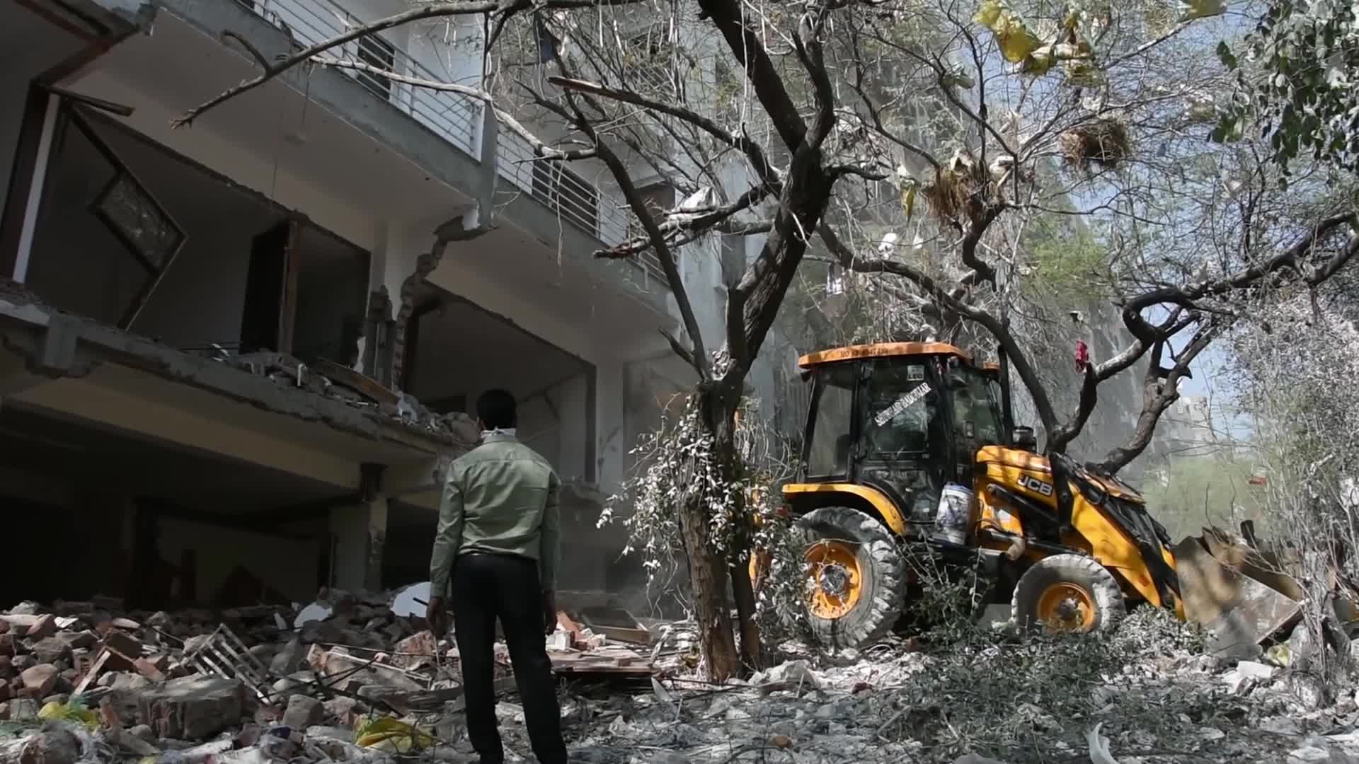 Heavy Machinery Razes Illegal Structures in Mehrauli, Delhi