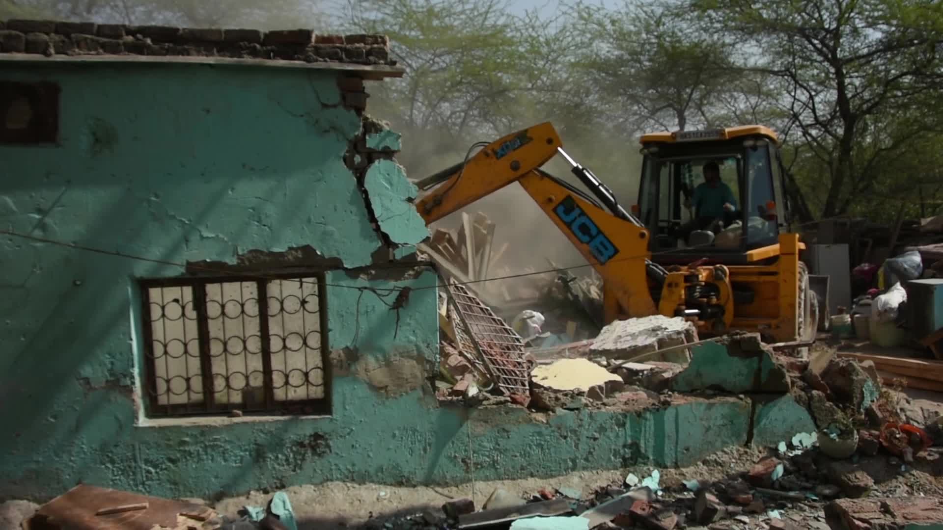 Heavy Machinery Razes Illegal Structures in Mehrauli, Delhi