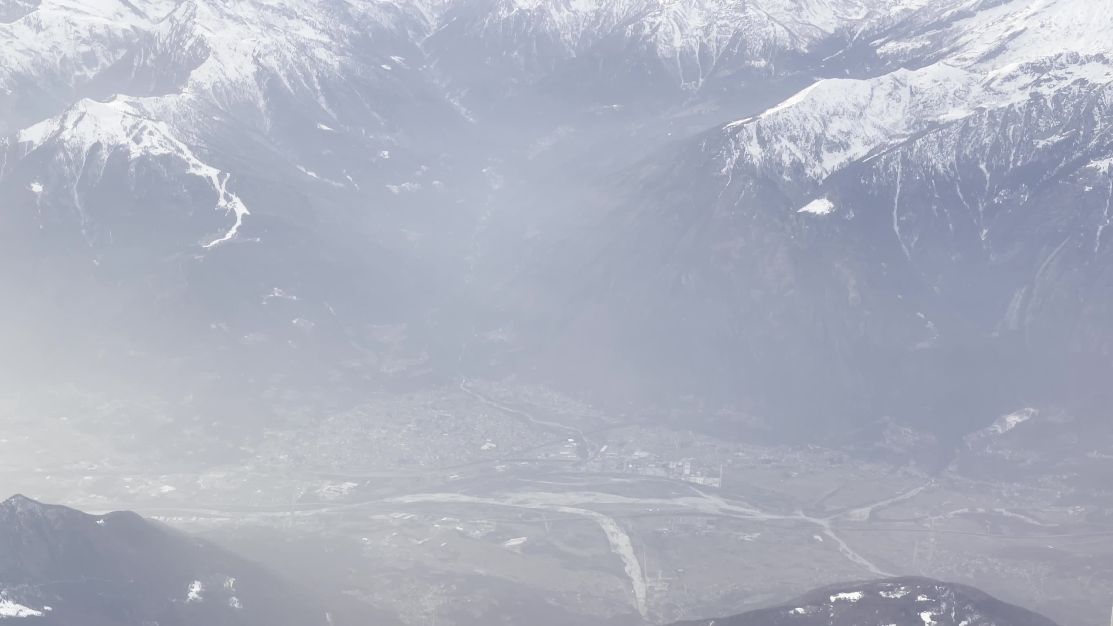 Sunset Over The Alps During A Flight