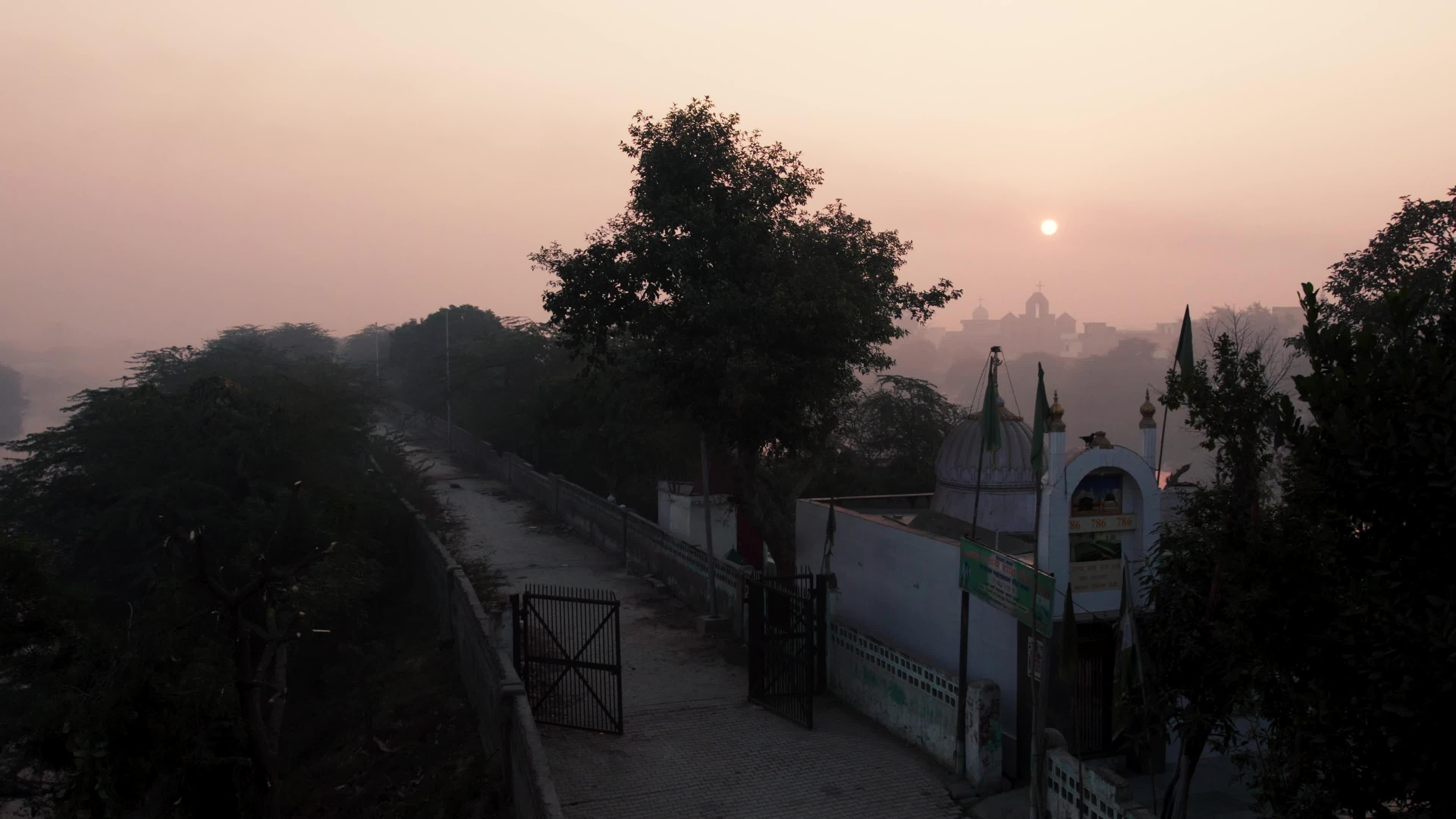 An early morning aerial video of a mosque on the banks of Najafgarh Drain, New Delhi, India
