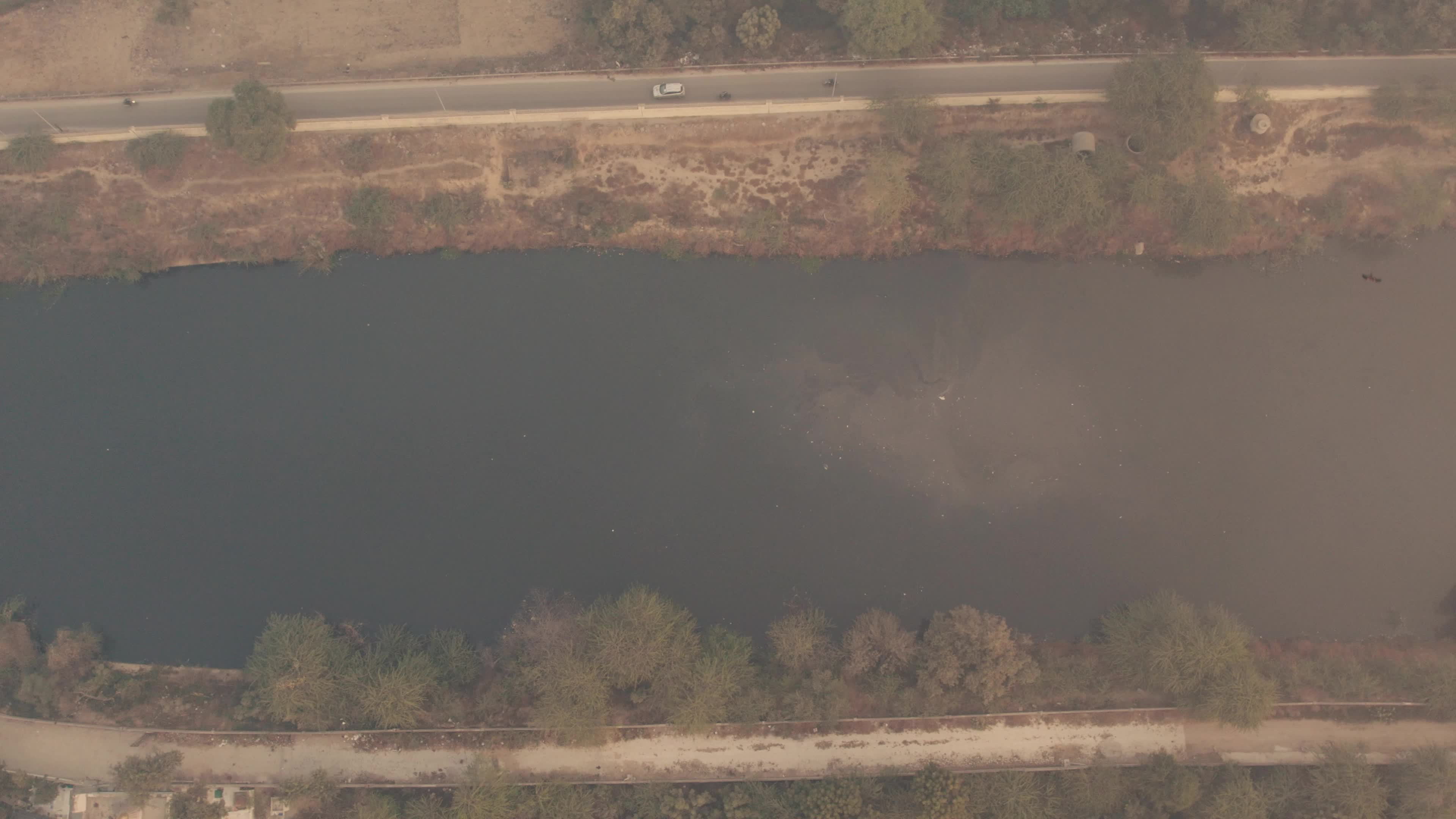 An early morning aerial video of Najafgarh Drain, New Delhi, India