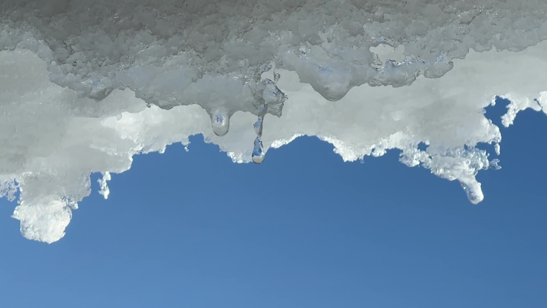 Snow and ice melting in the Winter sun