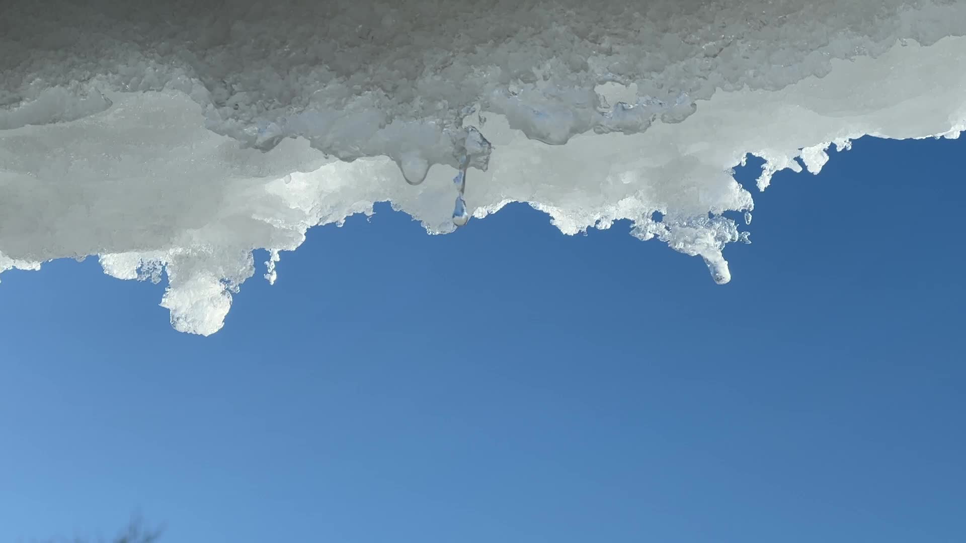 Snow and ice melting in the Winter sun
