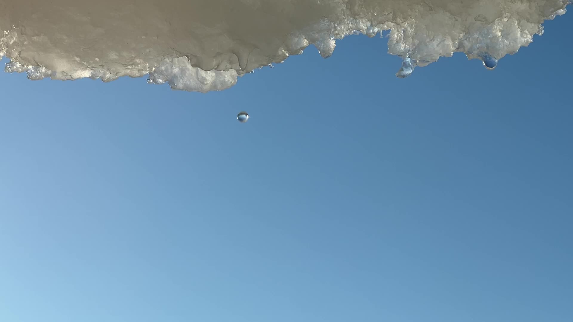 Snow and ice melting in the Winter sun