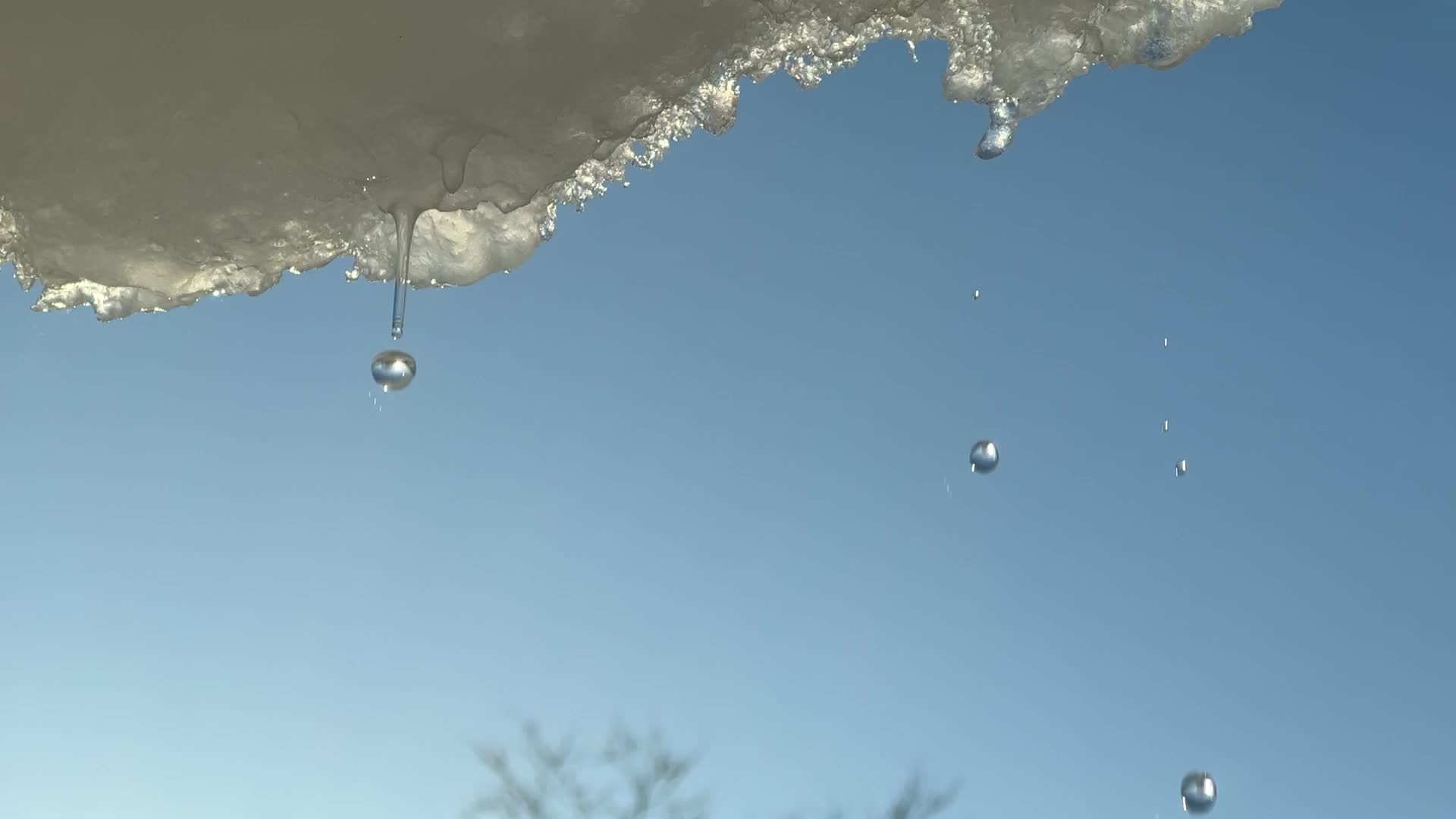 Snow and ice melting in the Winter sun