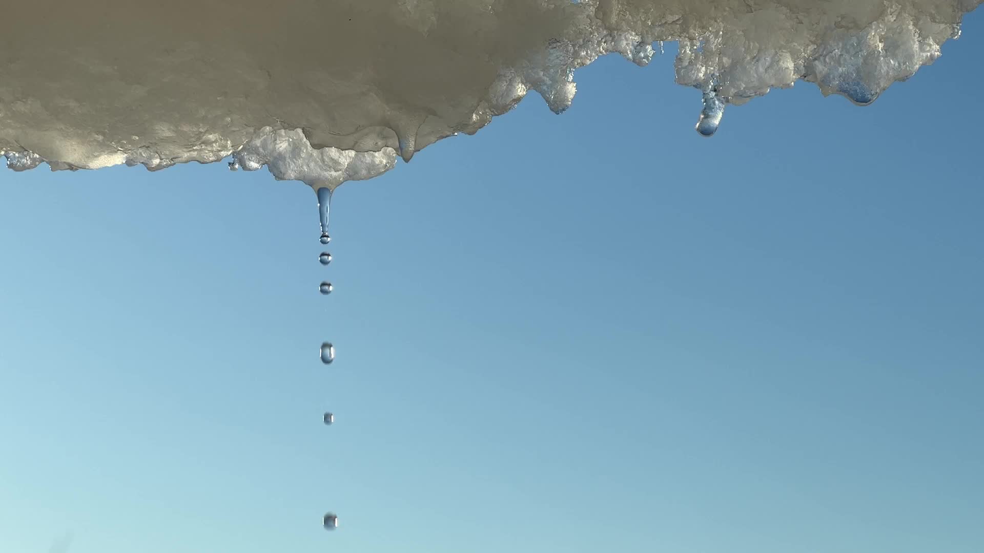 Snow and ice melting in the Winter sun