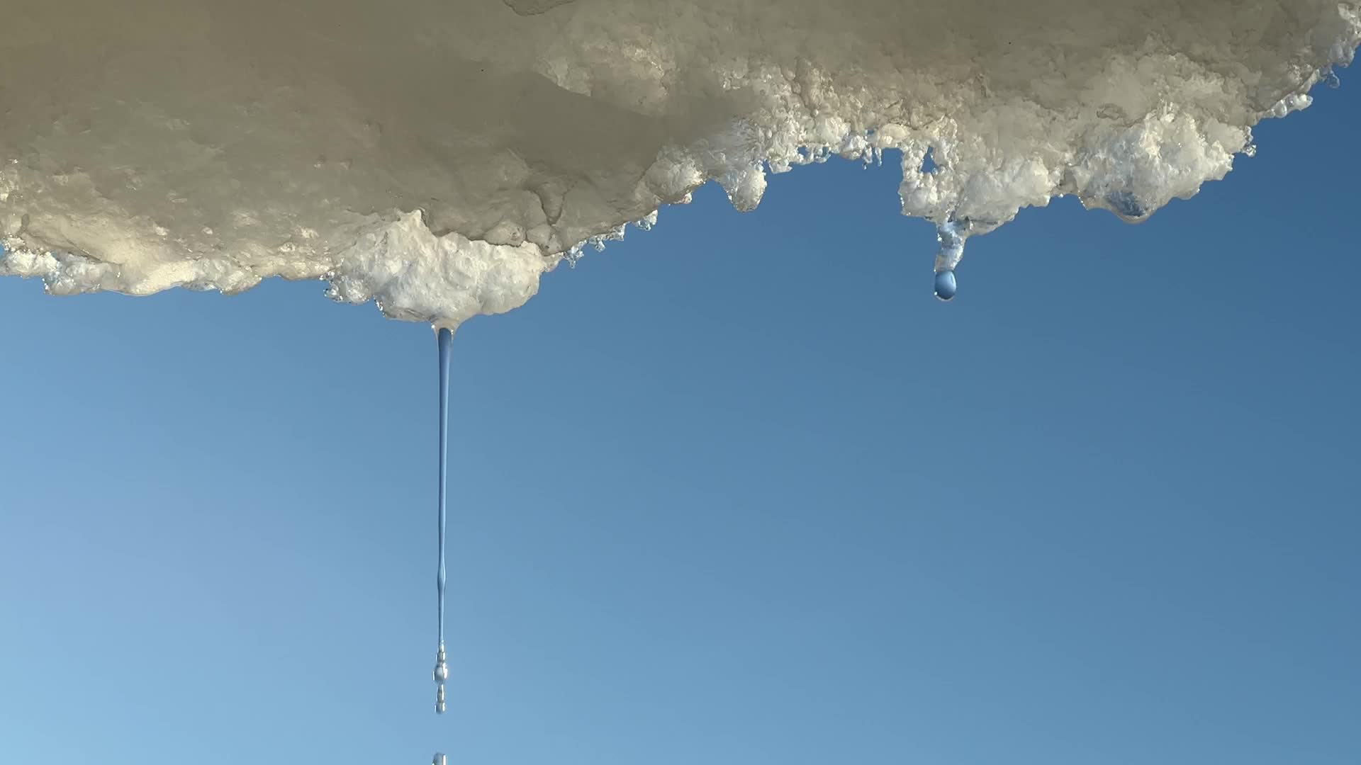 Snow and ice melting in the Winter sun