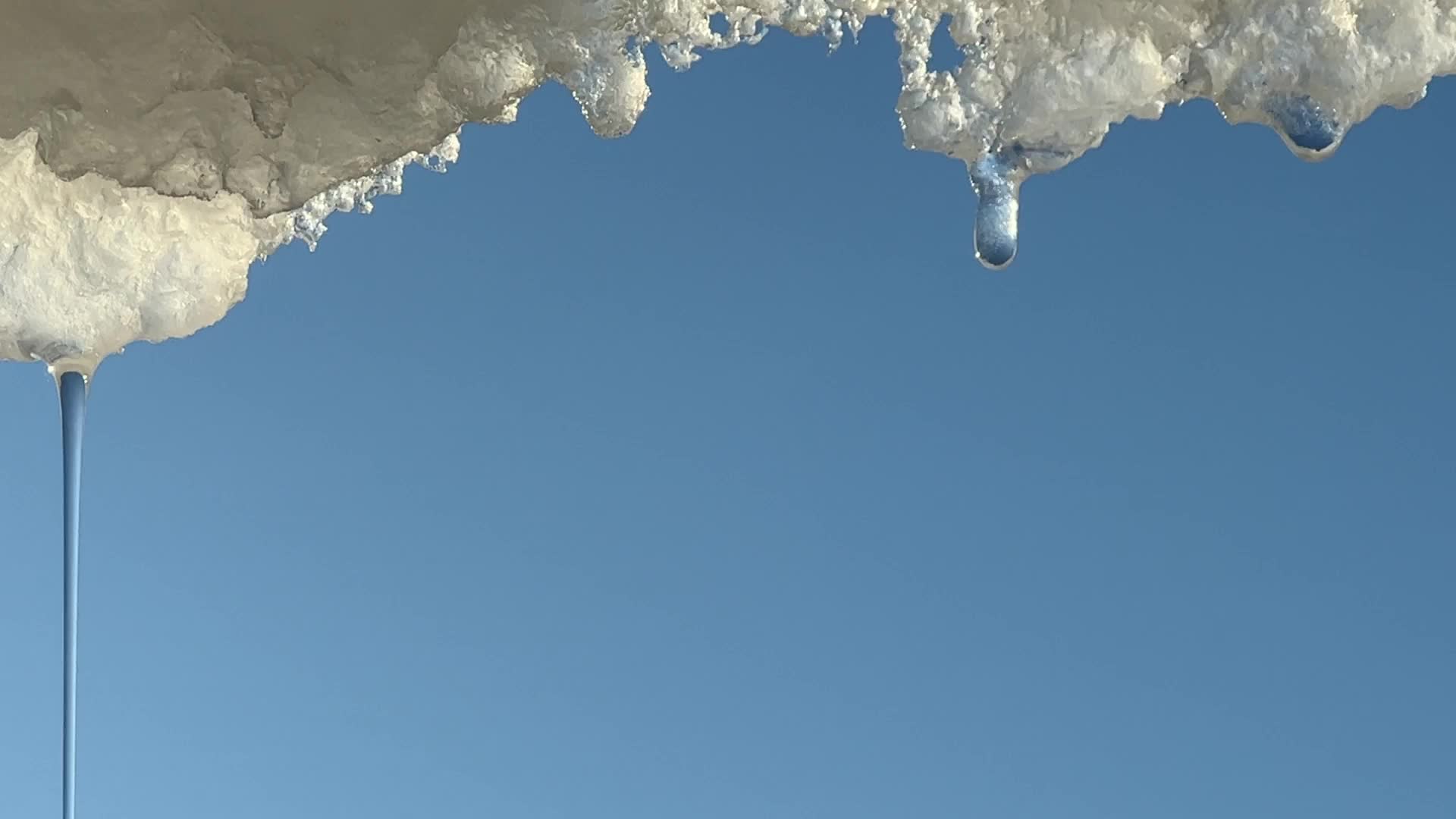 Snow and ice melting in the Winter sun