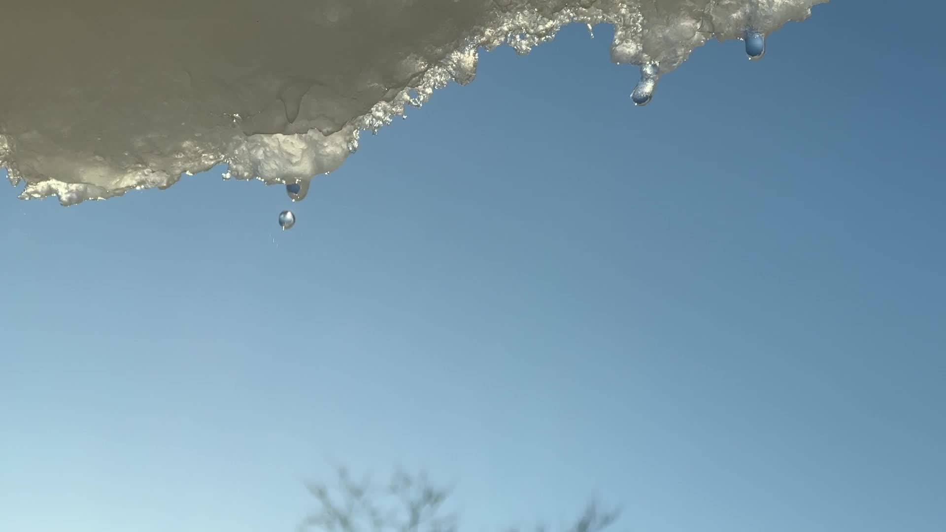 Snow and ice melting in the Winter sun
