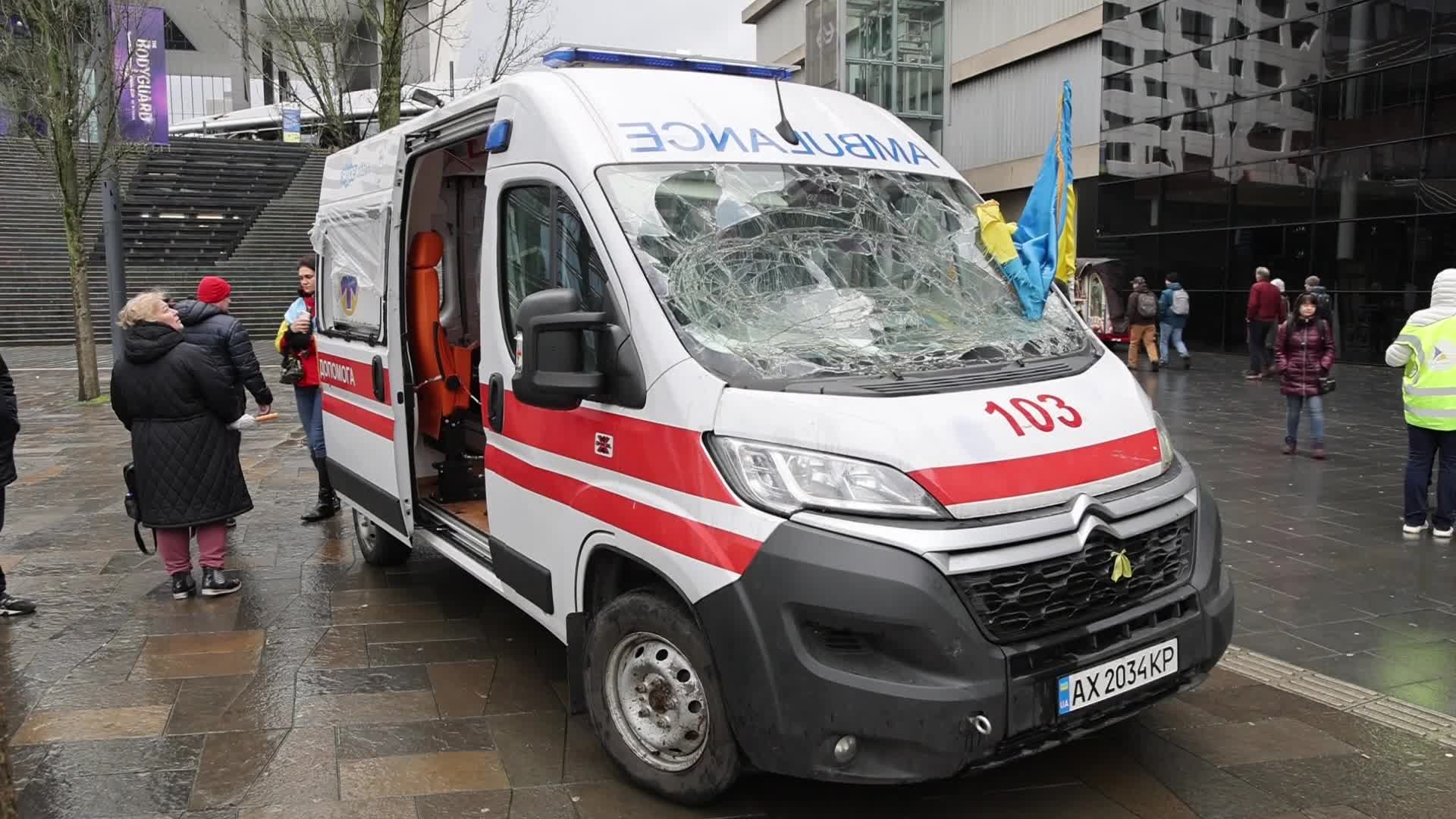 Damaged from artillery fire ambulance from Ukraine displayed in travel exhibition in Dutch cities - Tour de Ambulance