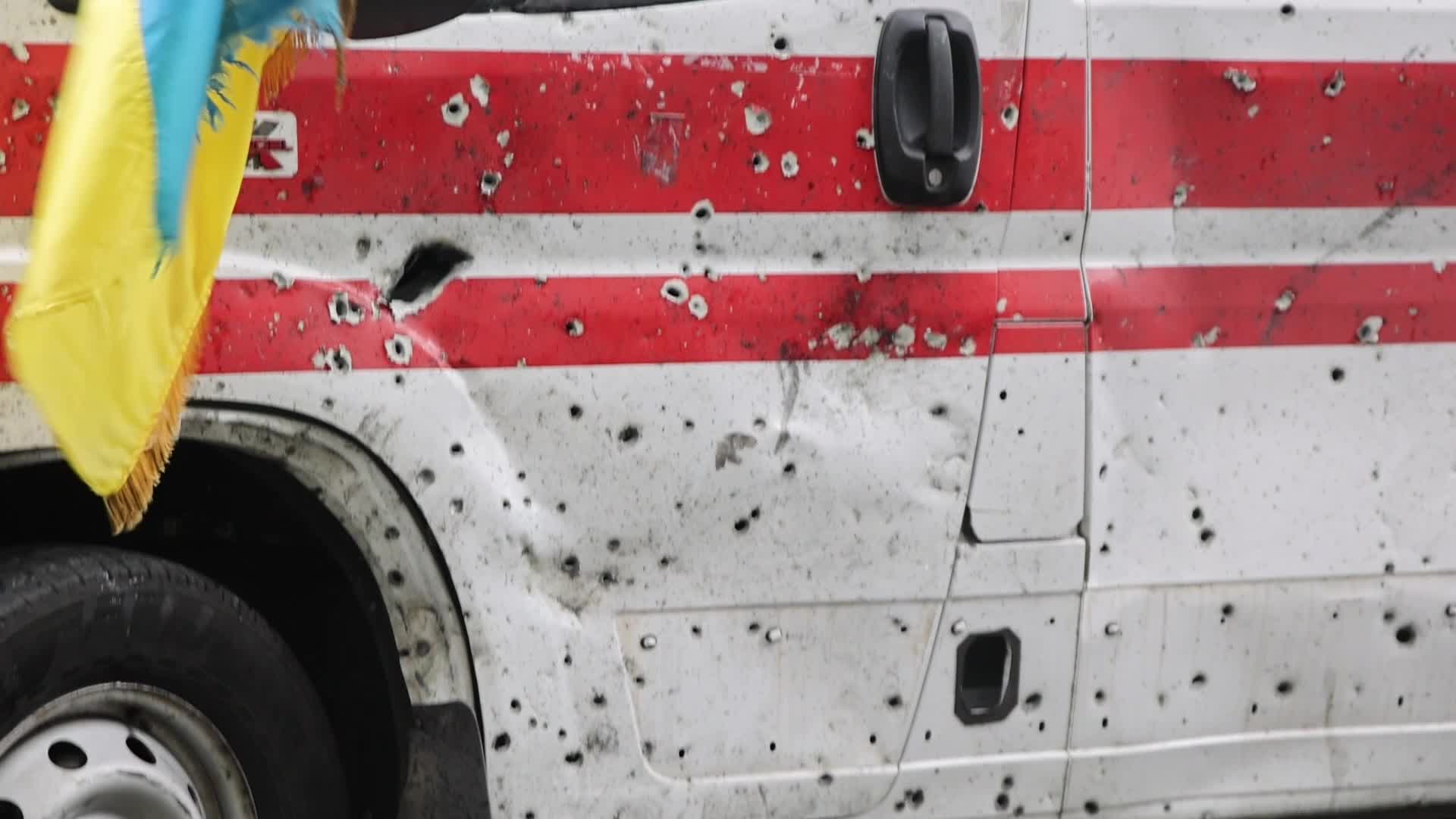 Damaged from artillery fire ambulance from Ukraine displayed in travel exhibition in Dutch cities - Tour de Ambulance
