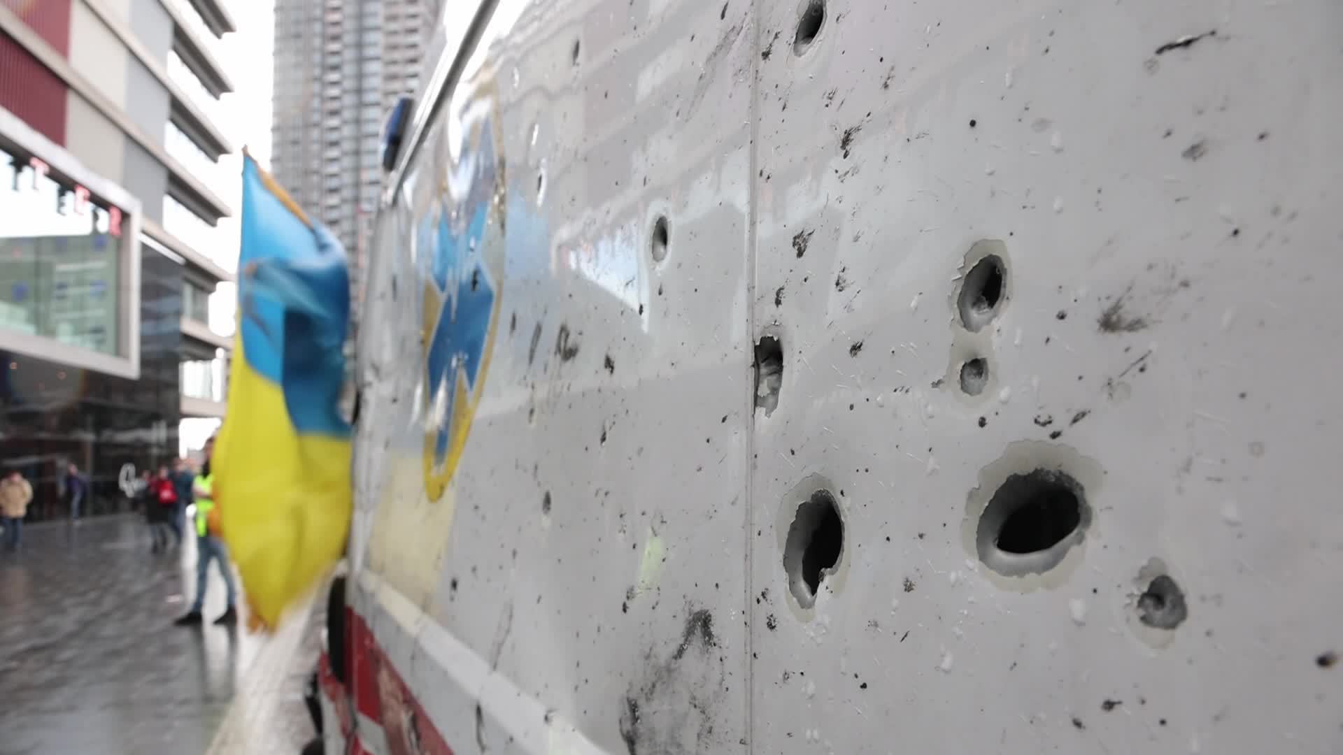 Damaged from artillery fire ambulance from Ukraine displayed in travel exhibition in Dutch cities - Tour de Ambulance