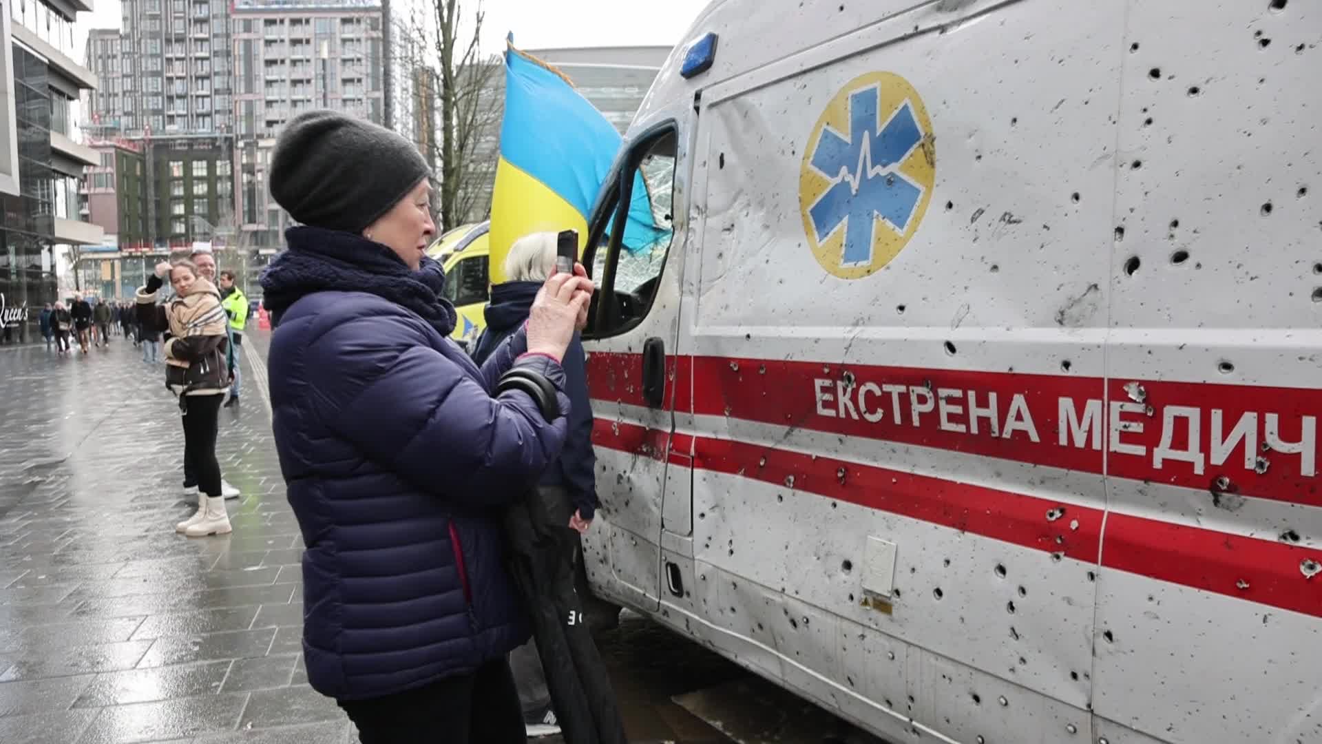 Damaged from artillery fire ambulance from Ukraine displayed in travel exhibition in Dutch cities - Tour de Ambulance