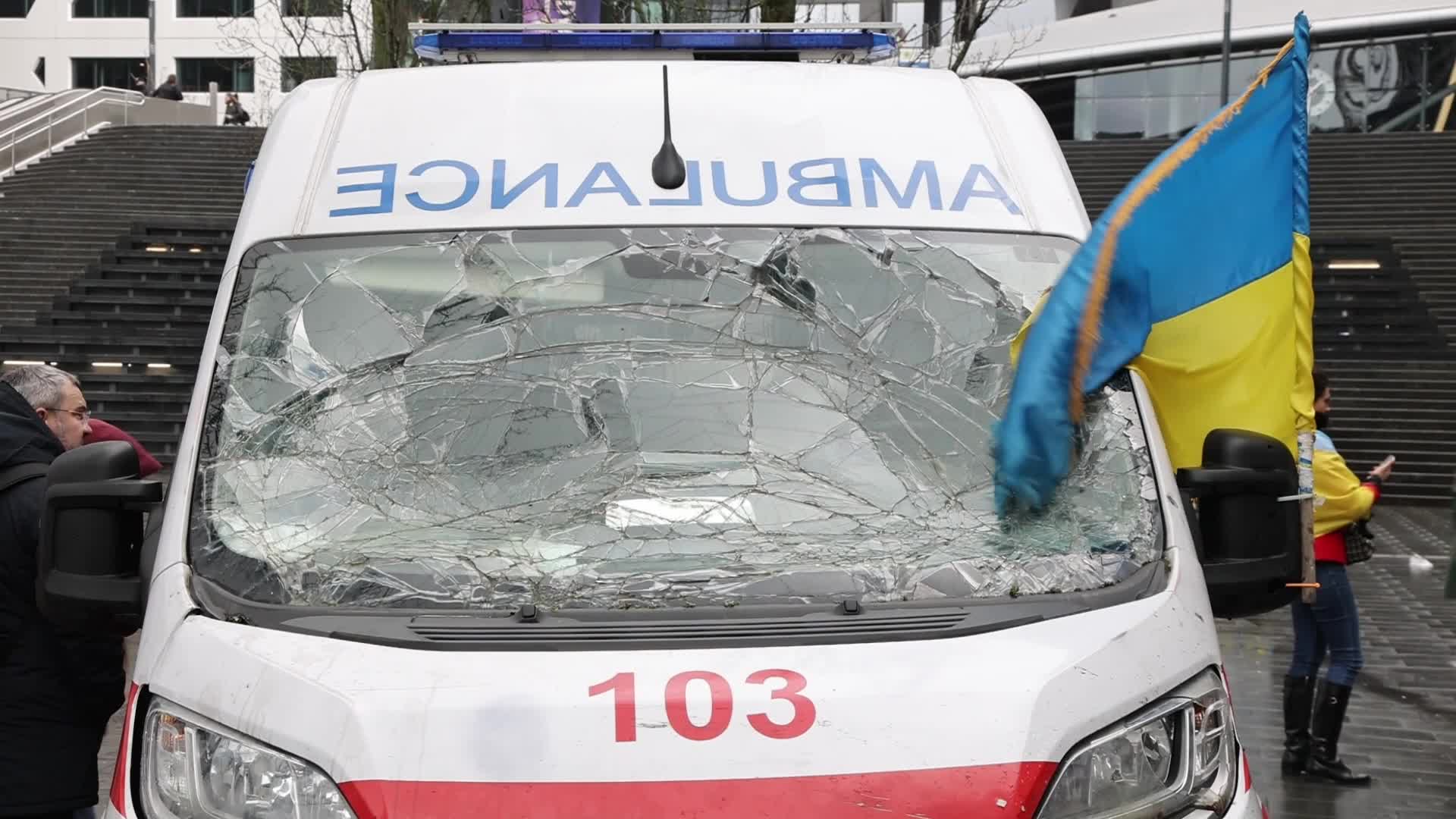 Damaged from artillery fire ambulance from Ukraine displayed in travel exhibition in Dutch cities - Tour de Ambulance