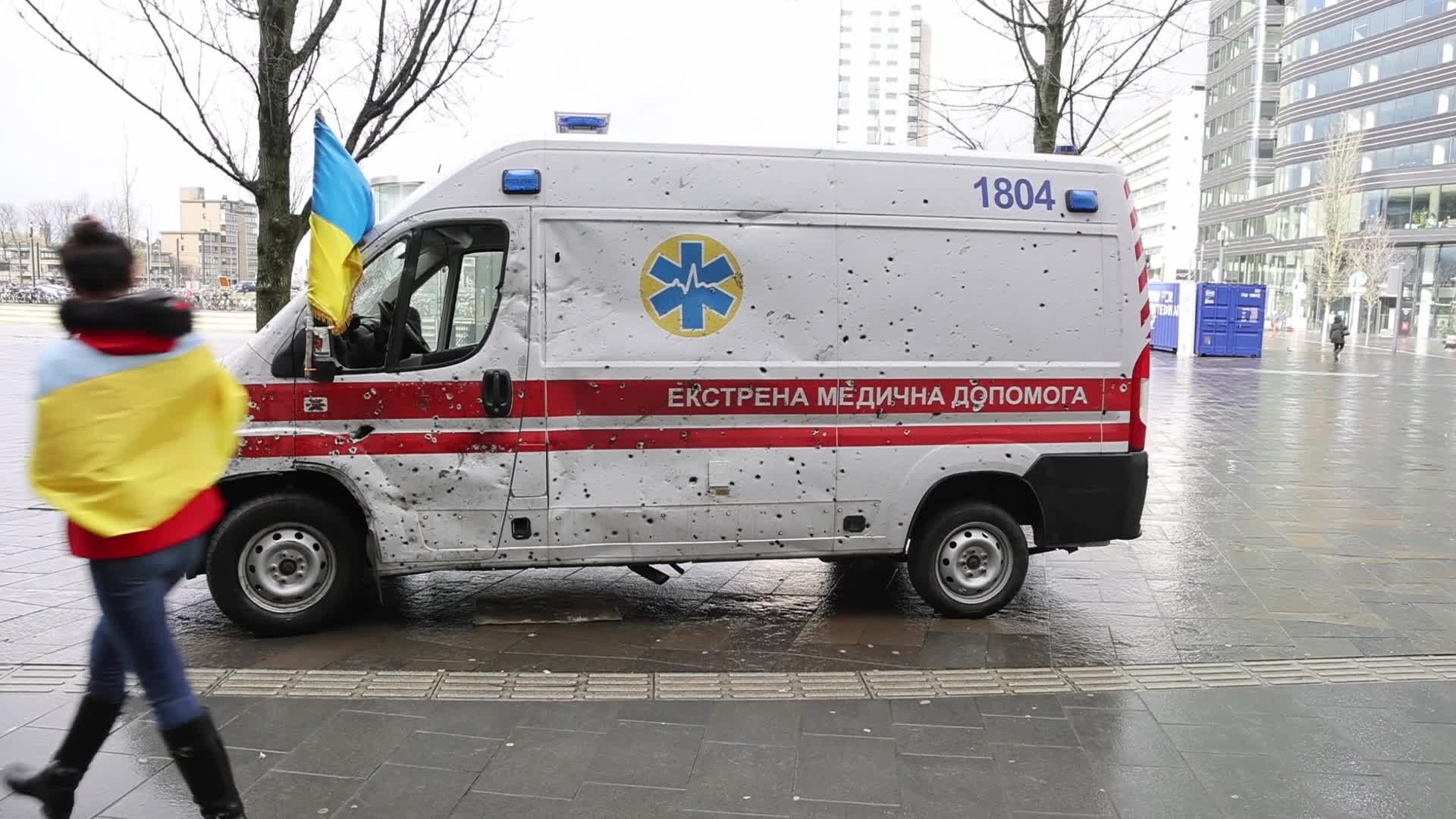 Damaged from artillery fire ambulance from Ukraine displayed in travel exhibition in Dutch cities - Tour de Ambulance